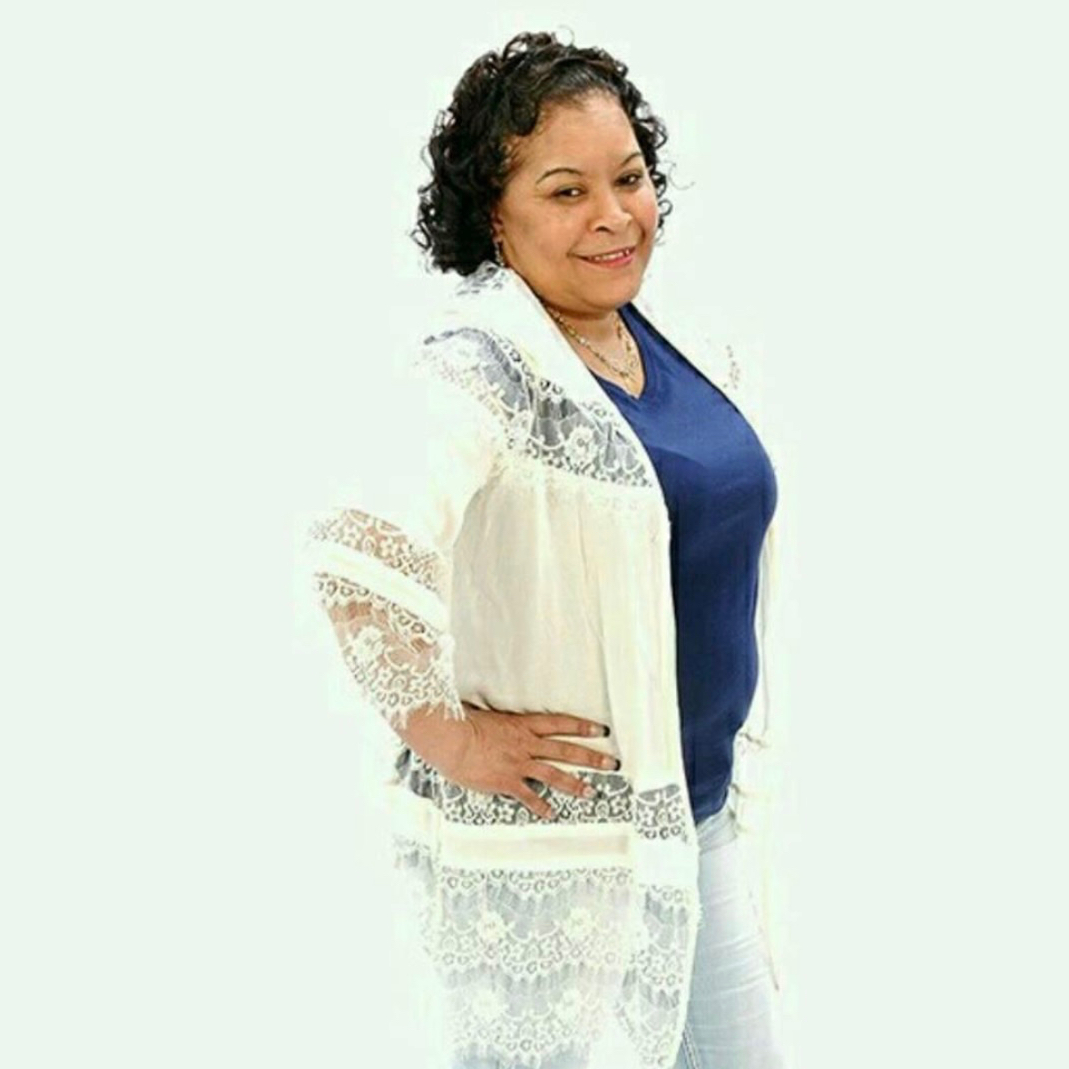 Yvette E. (Shing) Smith