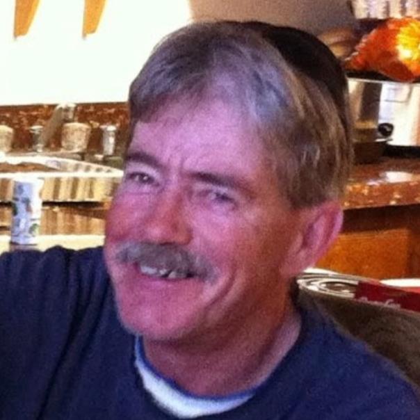 Russell Huesby Obituary