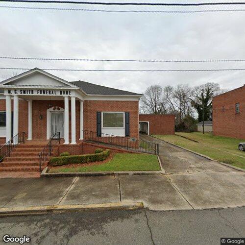 M C Smith Funeral Home Inc